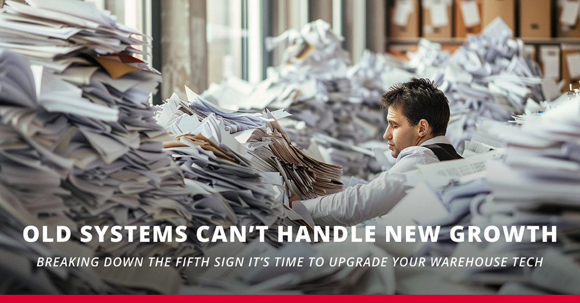 Man in a pile of papers needing Scalable warehouse solutions for growth
